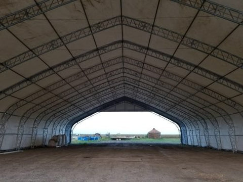 70′ WIDE DOUBLE TRUSS STORAGE BUILDINGS - with Standard 70X150X28 26.5 OZ PVC Cover | Sold by Uncle Wiener's Wholesale