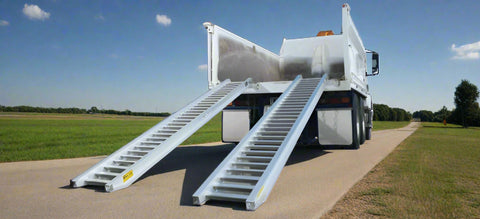 10-foot aluminum loading ramps placed on utility trailer
Heavy-duty HDR300 loading ramps close-up with grip detail
Side view of aluminum ramp showing gradual incline
Vehicle approaching wide aluminum loading ramps
Industrial pair of loading ramps for heavy machinery