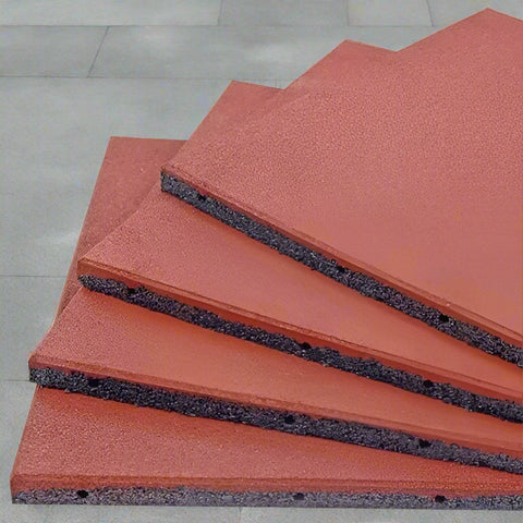 Interlocking red rubber patio tile close-up
20x20 rubber tile stacked set – top view
Playground flooring tile – angled corner
Red rubber tiles for outdoor use
Rubber tile texture – slip-resistant surface