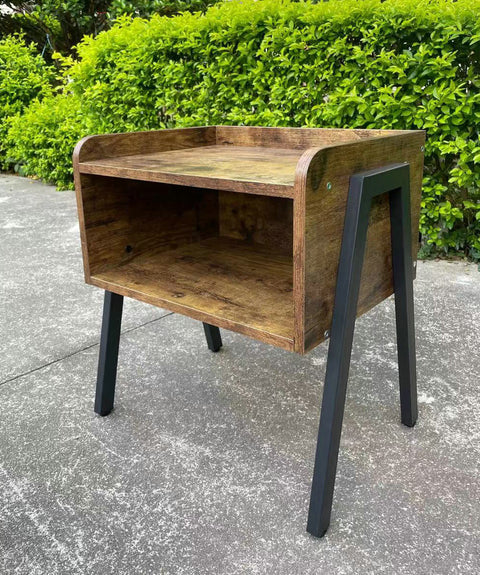 Stackable rustic wood and metal nightstand in bedroom
Industrial bedside table with black metal legs
Dual-tier MDF nightstand in modern space
Wooden nightstand stacked for storage
Compact rustic nightstand for small room
