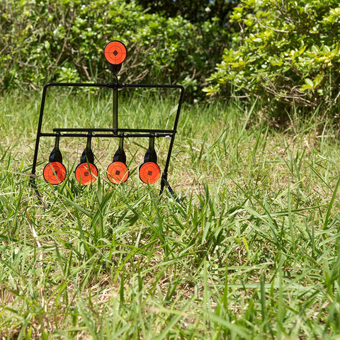 Heavy-duty .22LR steel plinking target mounted in backyard grass