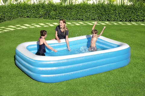 Bestway inflatable rectangular paddling pool with family inside
Top-down view of Bestway blue inflatable pool
Inflatable pool on grass with children playing
Side angle of Bestway pool showing two air chambers
Dimensions of Bestway family pool
Family enjoying inflatable pool in the backyard
Rectangular Bestway paddling pool setup outdoors