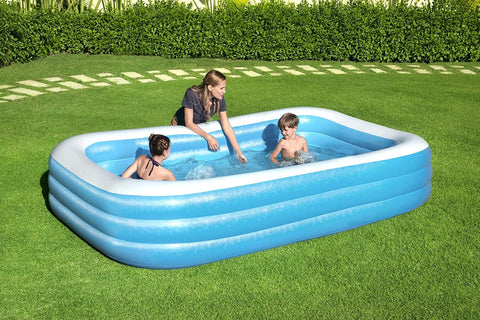 Bestway inflatable rectangular paddling pool with family inside
Top-down view of Bestway blue inflatable pool
Inflatable pool on grass with children playing
Side angle of Bestway pool showing two air chambers
Dimensions of Bestway family pool
Family enjoying inflatable pool in the backyard
Rectangular Bestway paddling pool setup outdoors