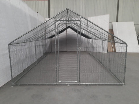 10x20 metal dog kennel cage with chicken wire fence
Walk-in outdoor animal enclosure for chickens or dogs
Backyard fenced compound with metal frame
Secure livestock pen with galvanized steel construction
Versatile pet and poultry cage outdoors