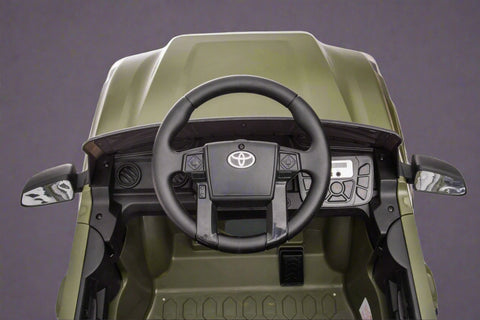 Olive green Toyota-style ride-on pickup truck for kids
Side view of remote-control kids truck with leather seat
Child’s electric ride-on truck with LED headlights
Toyota ride-on truck in olive green with suspension
Battery-powered pickup truck for toddlers