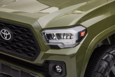Olive green Toyota-style ride-on pickup truck for kids
Side view of remote-control kids truck with leather seat
Child’s electric ride-on truck with LED headlights
Toyota ride-on truck in olive green with suspension
Battery-powered pickup truck for toddlers