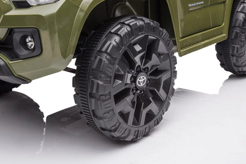 Olive green Toyota-style ride-on pickup truck for kids
Side view of remote-control kids truck with leather seat
Child’s electric ride-on truck with LED headlights
Toyota ride-on truck in olive green with suspension
Battery-powered pickup truck for toddlers