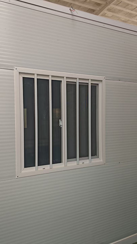Exterior Image: Portable 19 FT Folding Insulated Container Office with Lockable Door – Outdoor View
Interior Image: Inside View of Modular Prefab Cabin Office with Window and Electrical Plug
Folded View: Foldable Prefab Container for Easy Transport and Setup
Setup Process: Step-by-step Setup of 19 FT Folding Steel Container Office
Multiple Angles: Various Views of the Portable Modular Work Cabin