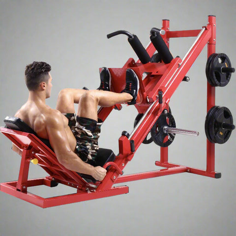 Red commercial 2-in-1 leg press and squat gym machine side view
User using leg press on heavy-duty fitness equipment
Squat bench setup on dual-function gym trainer 523624
PU leather padded seat and reverse pedal mechanism close-up
Front angle of multifunctional leg press squat machine in red