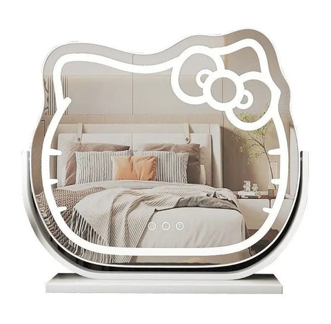 Hello Kitty LED lighted vanity mirror – front view
Oval-shaped pink and white cosmetic mirror on vanity
Mirror lit in 3 different LED color settings
Close-up of Hello Kitty bow design
Free-standing mirror on dressing table