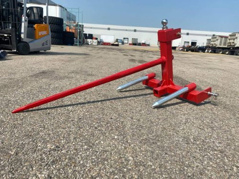 Red 3-point gooseneck hitch with bale spear mount
Tractor trailer hitch attachment with hay spear slots
Reinforced hitch frame for Conus 2 and Conus 1 spear placement
3-point trailer hitch attachment mounted on tractor
Spear holes and 2” trailer receiver on attachment frame