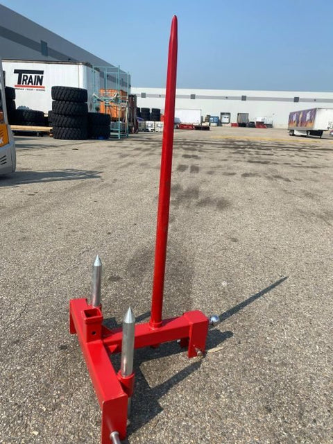 Red 3-point gooseneck hitch with bale spear mount
Tractor trailer hitch attachment with hay spear slots
Reinforced hitch frame for Conus 2 and Conus 1 spear placement
3-point trailer hitch attachment mounted on tractor
Spear holes and 2” trailer receiver on attachment frame