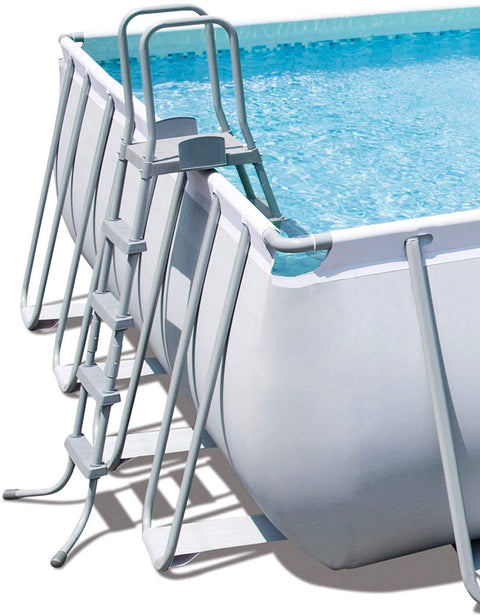 Large rectangular above ground pool with sand filter pump