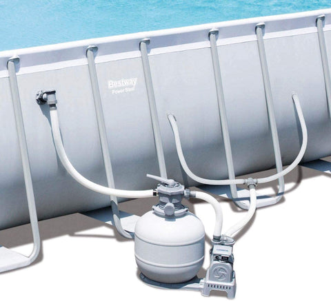 Side view of 31' x 16' steel frame backyard pool with ladder