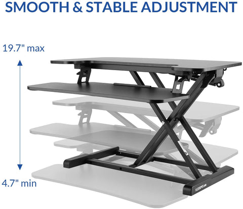 32 inch standing desk riser with keyboard tray
sit-stand workstation converter for office
height adjustable desktop riser setup
ergonomic workstation for dual monitors
home office sit-stand desk converter
