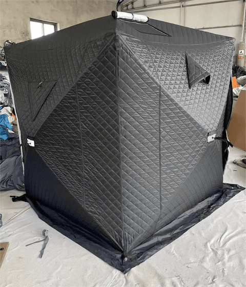 "Heavy-duty insulated pop-up ice fishing tent for 4-6 people"
"Black pop-up ice shelter with durable waterproof construction"
"Spacious insulated tent for winter camping and ice fishing"
"Pop-up setup ice fishing tent with chimney port option"
"Portable insulated ice fishing shelter with heavy-duty fabric"