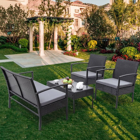 Black rattan outdoor furniture set with loveseat and chairs
4-piece outdoor patio set with glass coffee table on patio
Weather-resistant black PE rattan seating with cushions
Loveseat and two single chairs outdoor set with glass table