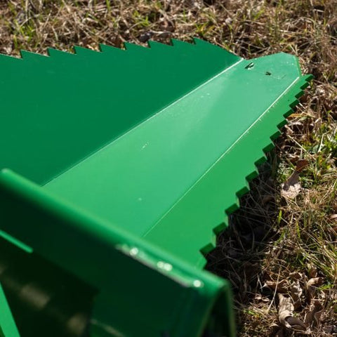 43-inch clamp-on pallet forks with stabilizer bar installed on tractor
Skid steer pallet forks loading hay bales
Adjustable clamp pallet forks for farm and industrial use
Tractor bucket pallet fork attachment with 4,000 lb capacity
Clamp-on pallet forks close-up showing tension screws and bracket