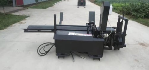 Skid steer firewood processor with 45-ton splitter attached
Log splitter with Stihl saw mounting plate
Firewood processing log cradle and splitting wedge
Heavy-duty 45-ton log processor on worksite
Operator splitting wood from skid steer seat