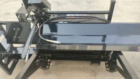 Skid steer firewood processor with 45-ton splitter attached
Log splitter with Stihl saw mounting plate
Firewood processing log cradle and splitting wedge
Heavy-duty 45-ton log processor on worksite
Operator splitting wood from skid steer seat