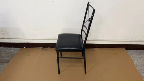“Black metal dining table set with 4 chairs in modern kitchen”
“Compact 5-piece dining set with faux leather seats”
“Close-up of black chair with slatted back and cushioned seat”
“Space-saving dining table with wood grain finish”
“Modern 5-piece table and chair set for apartments”