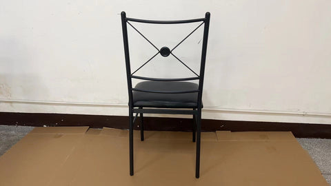 “Black metal dining table set with 4 chairs in modern kitchen”
“Compact 5-piece dining set with faux leather seats”
“Close-up of black chair with slatted back and cushioned seat”
“Space-saving dining table with wood grain finish”
“Modern 5-piece table and chair set for apartments”