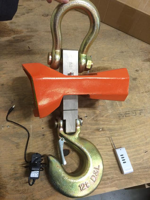 5 Ton Heavy-Duty Crane Scale with Digital Display β Yellow Model
10 Ton Crane Hanging Scale with LCD Display β Orange Model
Heavy-Duty Crane Scale with Remote Control in Use
Remote-Controlled Industrial Crane Scale β Front and Side View