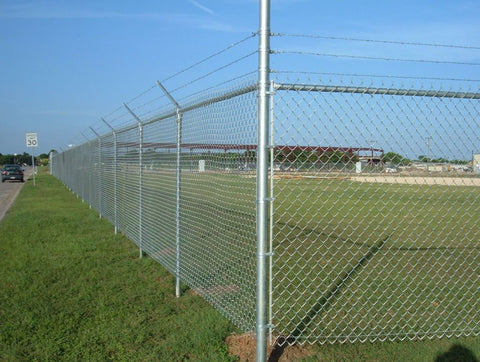 500 ft galvanized chain link fence with dual gates and barbed wire
Chain link security fence installation on a grass field
Close-up of barbed wire mounted on a galvanized post
Heavy-duty steel fence post and gate system
Wide-angle view of assembled fence perimeter kit