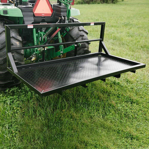 6 FT carry all platform for tractors β 3-point hitch rear attachment
Rear view of black steel tractor carry platform with diamond plate deck
Close-up of pallet fork-compatible blade pockets on tractor platform