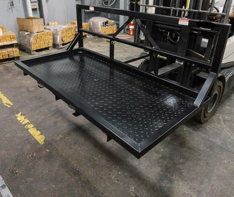 6 FT carry all platform for tractors β 3-point hitch rear attachment
Rear view of black steel tractor carry platform with diamond plate deck
Close-up of pallet fork-compatible blade pockets on tractor platform