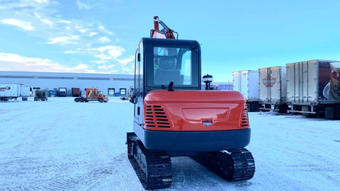6 Ton Red Mini Excavator at Work in Snow – Side View
Compact Tracked Excavator – Hydraulic Boom in Operation
Mini Excavator Digging in Construction Zone – Model 1027621
Tracked Compact Excavator on Job Site – Red Machine Front View