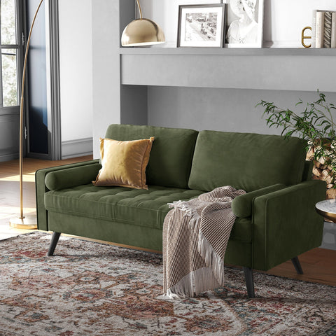 69.7-inch modern velvet sofa in navy blue with tufted back
Gray velvet upholstered sofa with pillows
Side view of modern green couch with wooden legs
Mid-century couch with tufted back and square arms