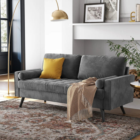 69.7-inch modern velvet sofa in navy blue with tufted back
Gray velvet upholstered sofa with pillows
Side view of modern green couch with wooden legs
Mid-century couch with tufted back and square arms