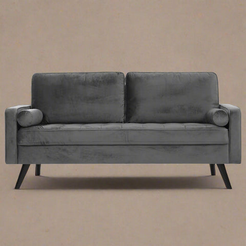 69.7-inch modern velvet sofa in navy blue with tufted back
Gray velvet upholstered sofa with pillows
Side view of modern green couch with wooden legs
Mid-century couch with tufted back and square arms