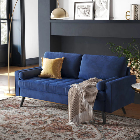 69.7-inch modern velvet sofa in navy blue with tufted back
Gray velvet upholstered sofa with pillows
Side view of modern green couch with wooden legs
Mid-century couch with tufted back and square arms