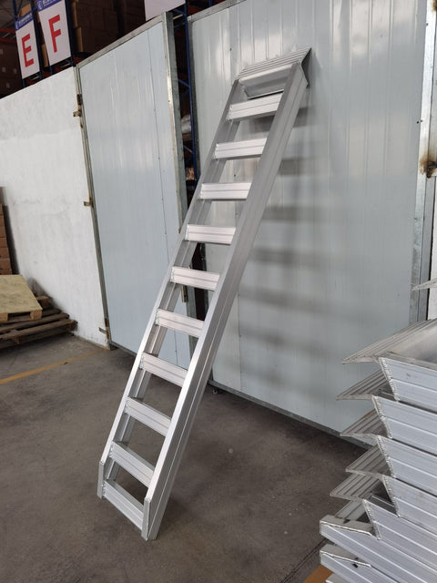 8 FT heavy-duty aluminum truck loading ramp folded
Foldable aluminum ramp for loading trucks and trailers
Side view of high-capacity 11000 lb aluminum loading ramp
Heavy-duty truck ramp in use for machinery loading