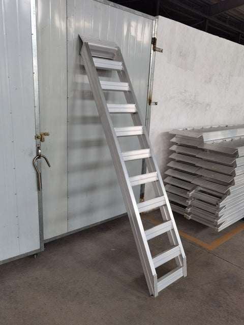 8 FT heavy-duty aluminum truck loading ramp folded
Foldable aluminum ramp for loading trucks and trailers
Side view of high-capacity 11000 lb aluminum loading ramp
Heavy-duty truck ramp in use for machinery loading