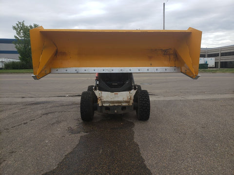 Bendall skid steer snow pusher attached to loader
Yellow snow box blade for skid steer
Heavy-duty snow bucket blade in winter setting
96-inch Bendall box blade in commercial snow use
Rear angle of Bendall snow blade showing mold board