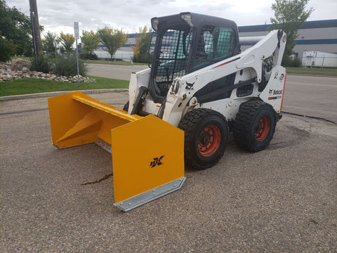 Bendall skid steer snow pusher attached to loader
Yellow snow box blade for skid steer
Heavy-duty snow bucket blade in winter setting
96-inch Bendall box blade in commercial snow use
Rear angle of Bendall snow blade showing mold board