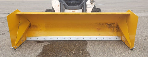 Bendall skid steer snow pusher attached to loader
Yellow snow box blade for skid steer
Heavy-duty snow bucket blade in winter setting
96-inch Bendall box blade in commercial snow use
Rear angle of Bendall snow blade showing mold board
