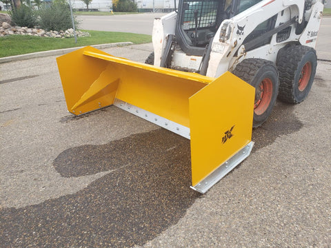 Bendall skid steer snow pusher attached to loader
Yellow snow box blade for skid steer
Heavy-duty snow bucket blade in winter setting
96-inch Bendall box blade in commercial snow use
Rear angle of Bendall snow blade showing mold board