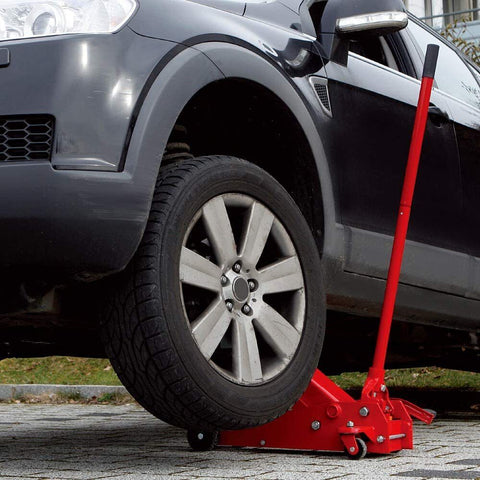 Big Red Steel Floor Jack – 2 Ton Hydraulic Lift Tool
Low Profile Red Garage Jack – Model T83502
Hydraulic Car Jack with Pedal and Casters
Heavy-Duty Vehicle Jack – Wide Base Support
Close-Up of Floor Jack Casters and Lifting Arm