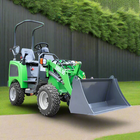 CanLift Lithium Electric Wheel Loader – Front View with Bucket
Green eco-friendly CanLift wheel loader on grass lot with trailer