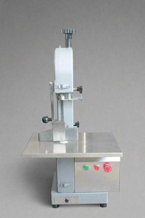 Main view of stainless steel meat and bone cutting saw machine
Compact commercial meat saw for kitchen or butcher use
Electric bone saw with sliding tray and safety guard
Replacement blade for commercial bone saw machine
Close-up of saw handle and stainless construction