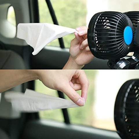 Passenger enjoying rear airflow from adjustable dual head car fan in sedan backseat