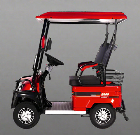 Side view of electric 4-wheel senior mobility scooter with red canopy
Front view of red electric personal golf cart
Rider sitting in senior mobility scooter outdoors
Back view of golf cart with 3-wheel configuration
Zoomed-in tire and motor components
Comfortable padded seat with backrest