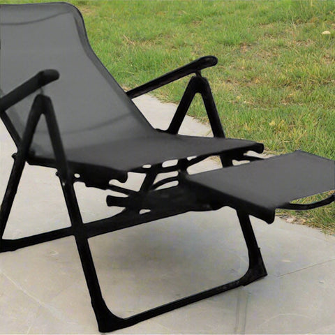 Outdoor ergonomic recliner chair – front angle view
Folding mesh camp chair in lounging position
Foldable chair with footrest deployed
Compact folded view of portable recliner