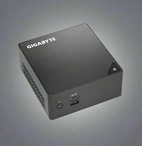 GIGABYTE BRIX mini PC with packaging
Intel Celeron J4105 mini desktop front view
Rear ports of BRIX GB-BLCE-4105 including HDMI, Ethernet, USB
Internal layout showing M.2 and 2.5” storage support
Ultra-compact BRIX mini PC on desk with monitor