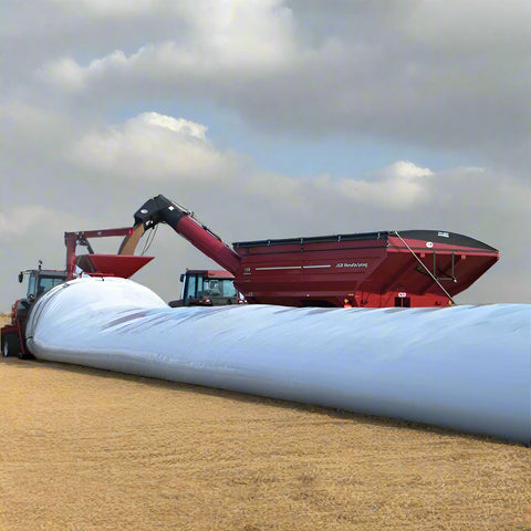 10 ft x 300 ft heavy duty grain bag filled with corn on a farm field
Polyethylene grain bag used for temporary harvest storage
Farm equipment loading grain into a 10 mil white grain bag
UV-protected 10 mil grain storage bag on rural property