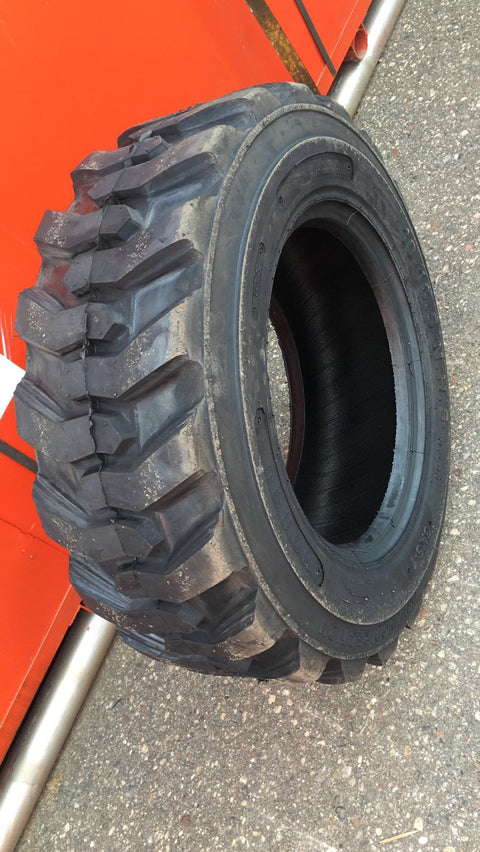 “Heavy duty skid steer tires with aggressive tread”
“SKS-1 and SKS-4 tires for Bobcat A300 and S750”
“Skid steer tires with red and silver rims”
“10x16.5 to 15x19.5 skid steer tire variants”
“Close-up of durable construction skid steer tire”